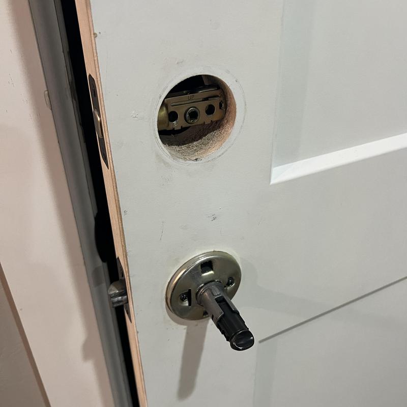 Door lock rekeying without keys in progress Door lock rekeying without keys in progress