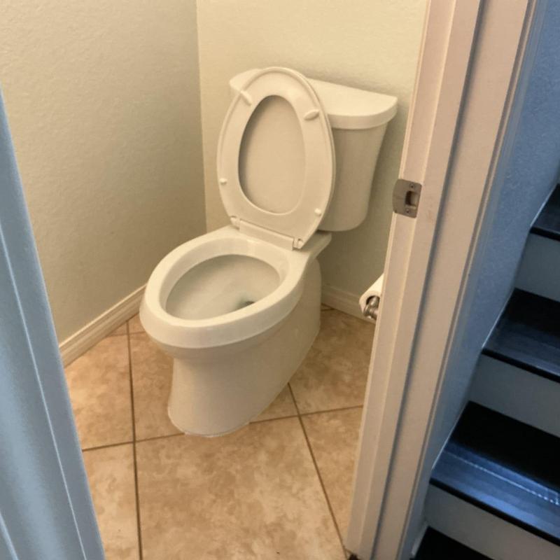 Toilet installation with wax ring and closet bolts Toilet installation with wax ring and closet bolts