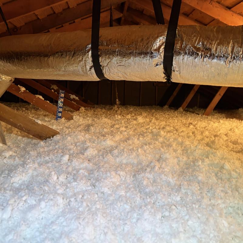 Attic blown-in insulation with ductwork in attic space Attic blown-in insulation with ductwork in attic space