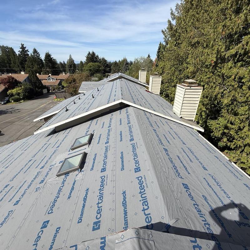 Roof underlayment installation on residential roof in Lynnwood
