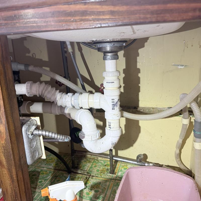 Kitchen sink drain pipes under cabinet with trap Kitchen sink drain pipes under cabinet with trap