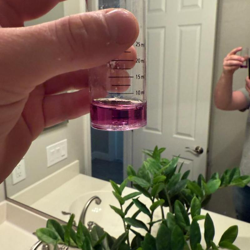 Water softener brine tank water test with pink solution