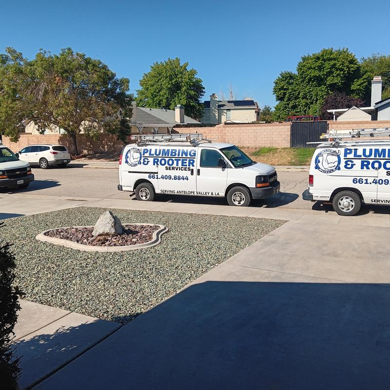 Aquapex piping and copper stubs plumbing vans parked outside Aquapex piping and copper stubs plumbing vans parked outside