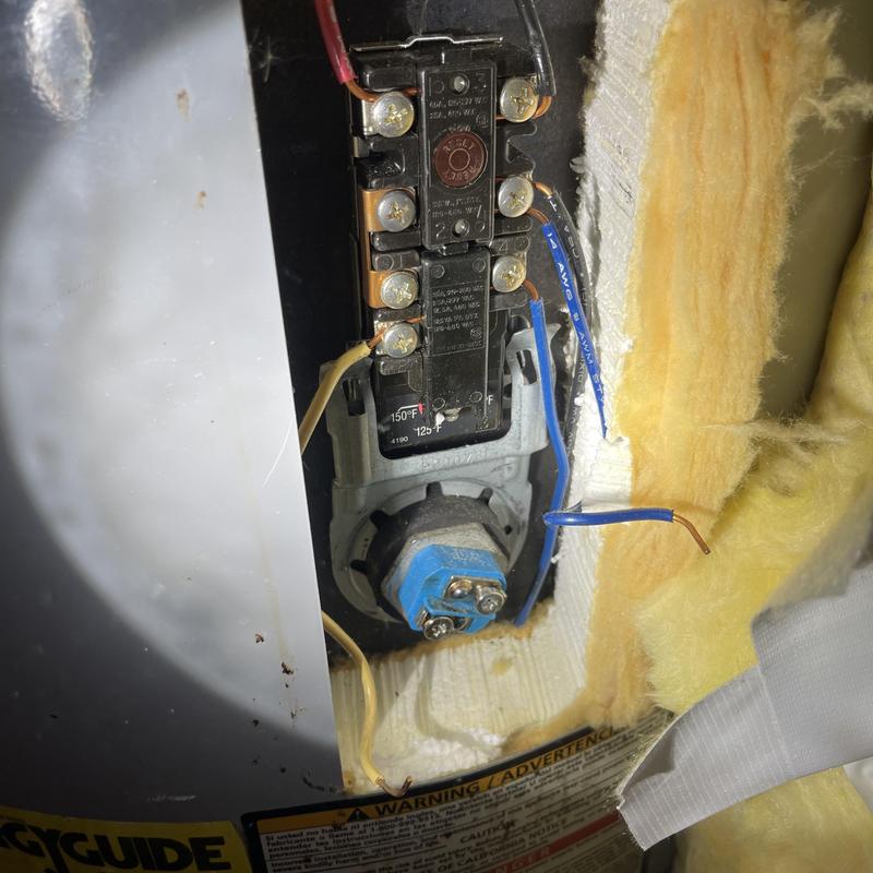 Water heater high limit switch with wiring exposed Water heater high limit switch with wiring exposed