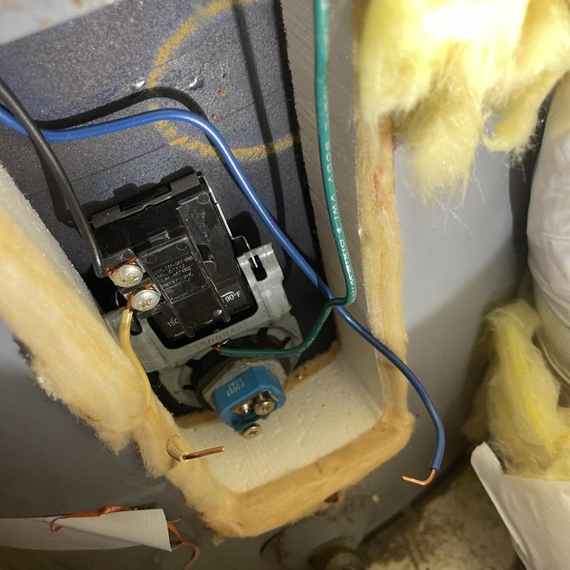 Water heater thermostat with exposed wiring and insulation Water heater thermostat with exposed wiring and insulation