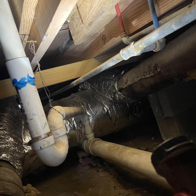 PVC drain pipes in crawl space plumbing inspection PVC drain pipes in crawl space plumbing inspection