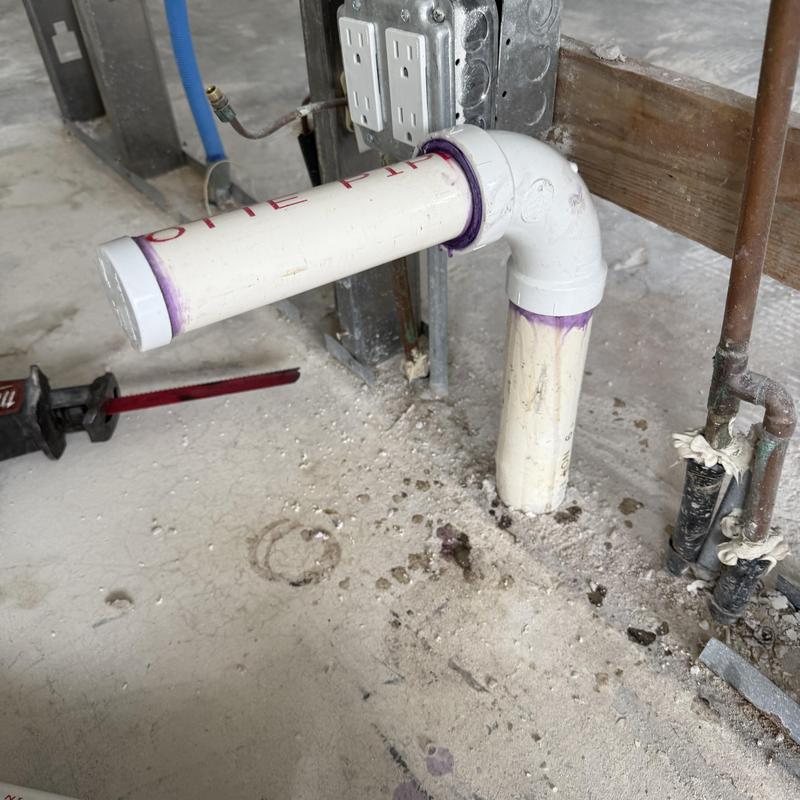 PVC kitchen drain stub-out in wall cavity
