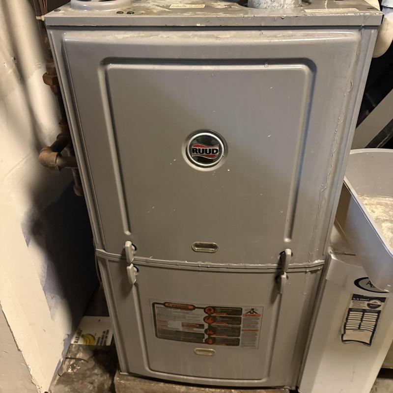 Furnace unit Ruud brand in utility room Furnace unit Ruud brand in utility room