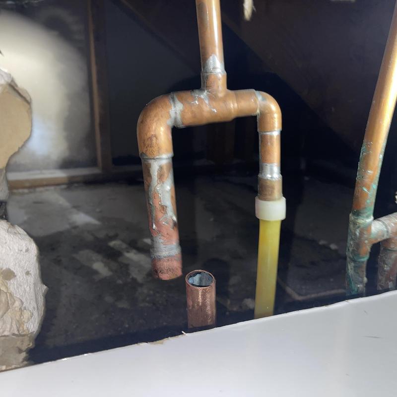 Copper water line with temporary cap in attic Copper water line with temporary cap in attic