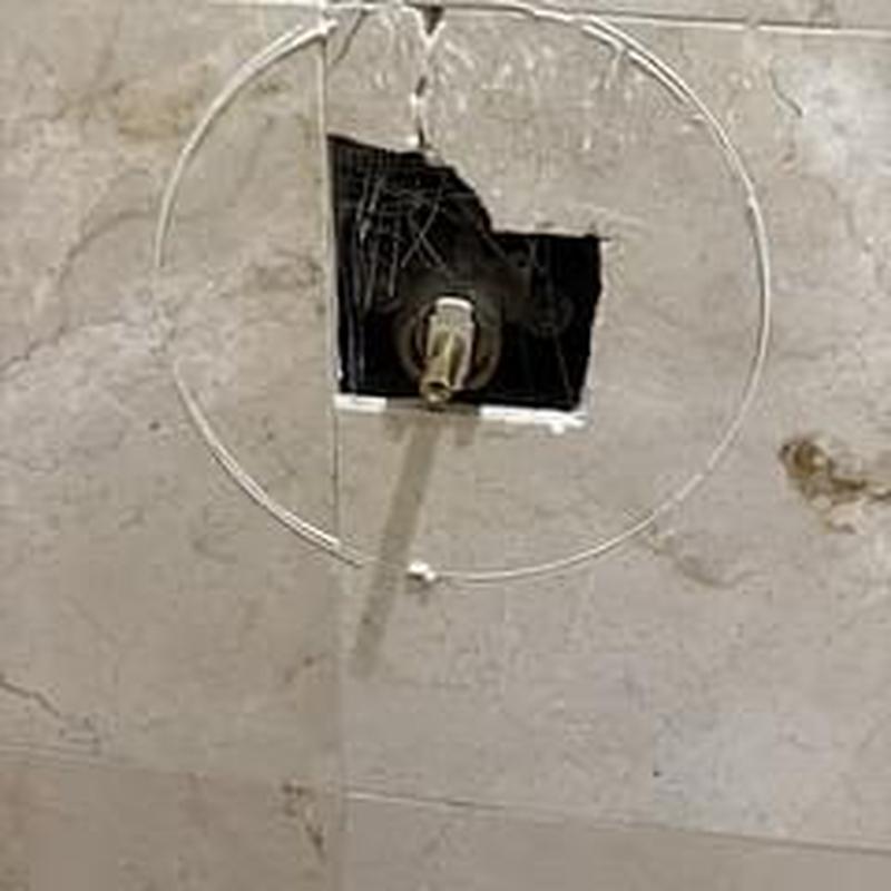 Shower valve with damaged cartridge and wall cutout