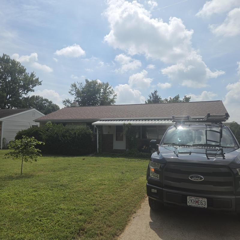 Residential roof quality control with roofing truck