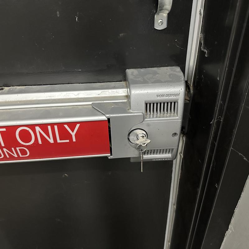 Alarm exit device with new key and battery installed Alarm exit device with new key and battery installed