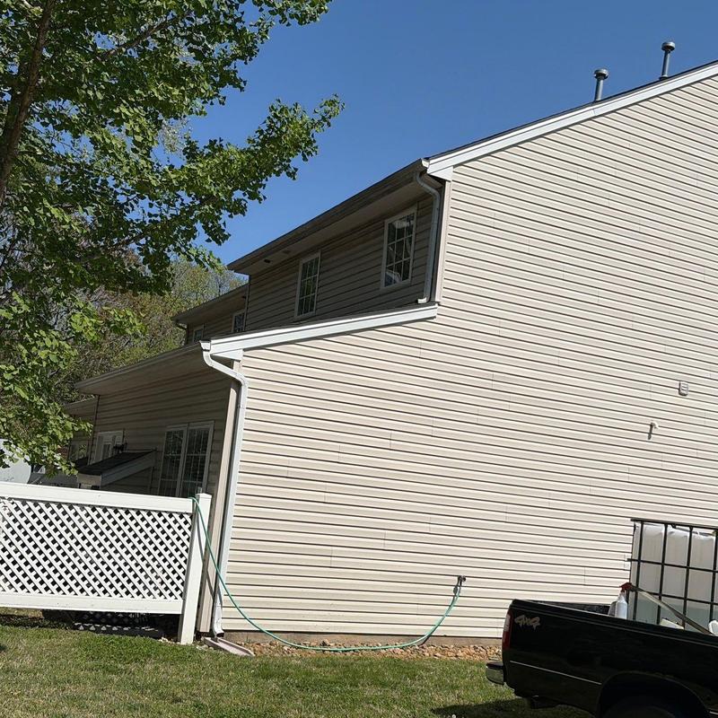 Vinyl siding exterior on residential home in sunlight
