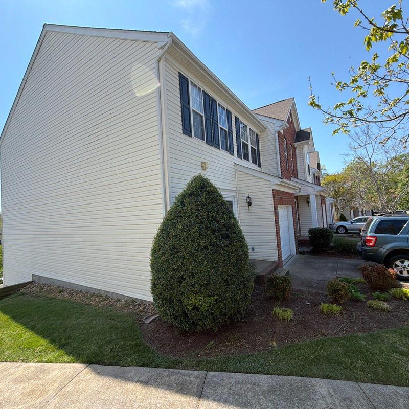 Vinyl siding with landscaping at residential units