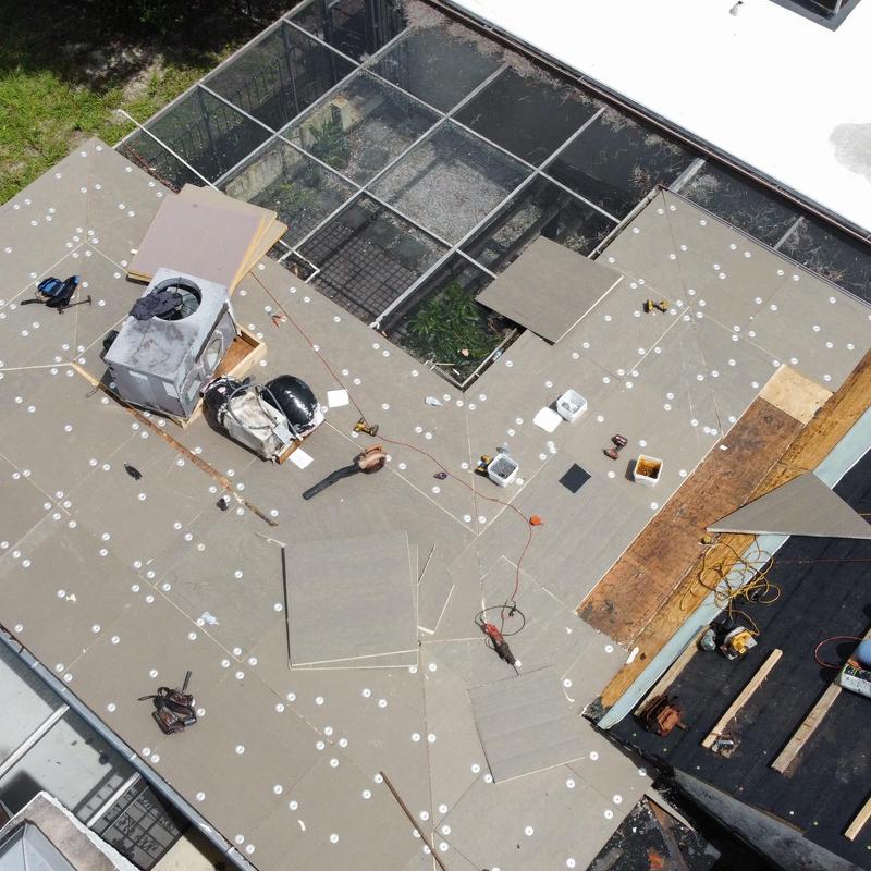 Flat roof decking installation with equipment and tools Flat roof decking installation with equipment and tools