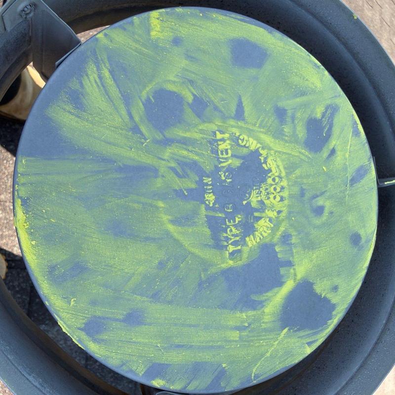 Roof vent cap with green dust markings