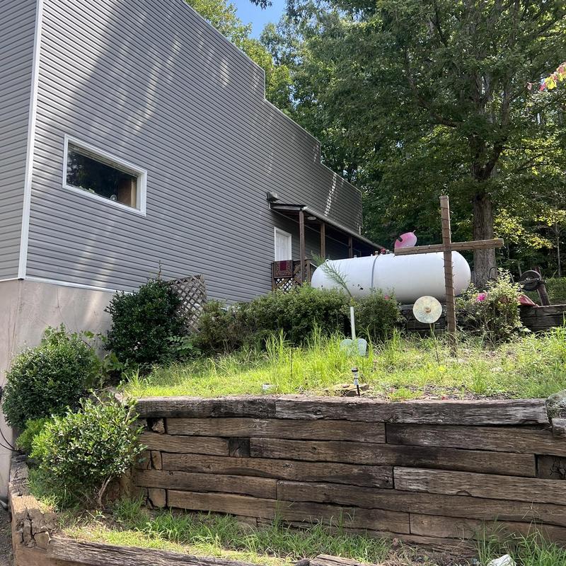 Vinyl siding replacement on residential building exterior