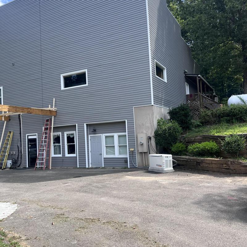 Elm Grove vinyl siding installation on building exterior