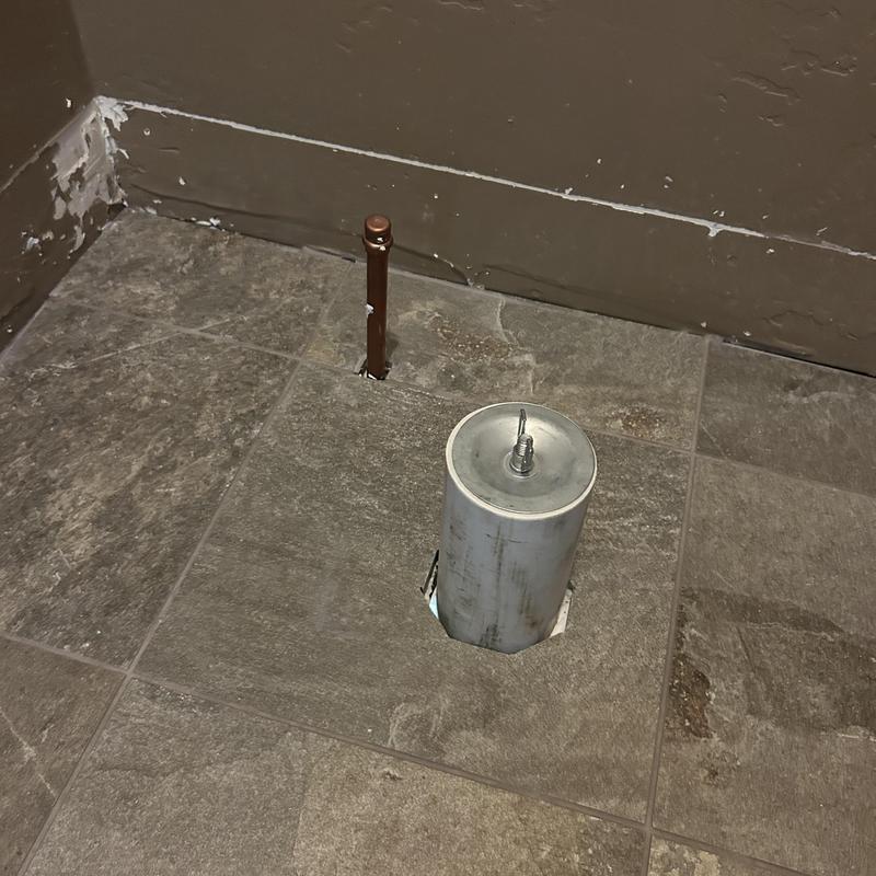 Toilet flange and angle stop installation on tiled floor Toilet flange and angle stop installation on tiled floor
