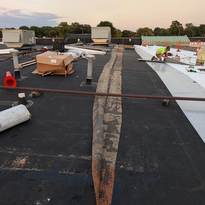 Flat Commercial EPDM Roof with TPO Restoration Work