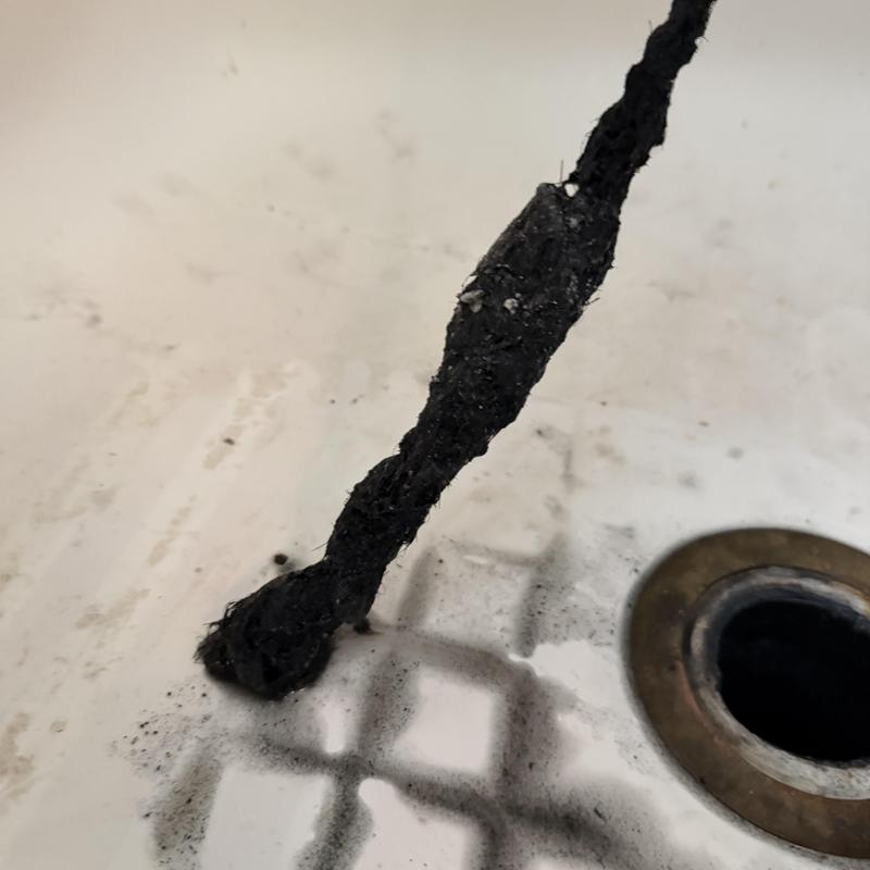 Shower drain clog with hair ball removal tool Shower drain clog with hair ball removal tool