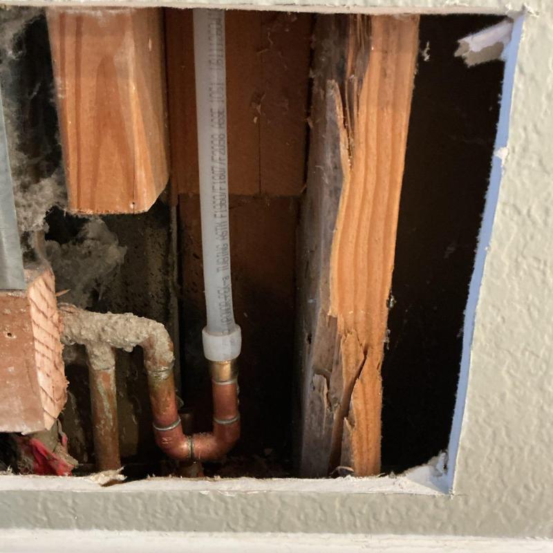 Half-inch PEX water line installation in wall cavity Half-inch PEX water line installation in wall cavity