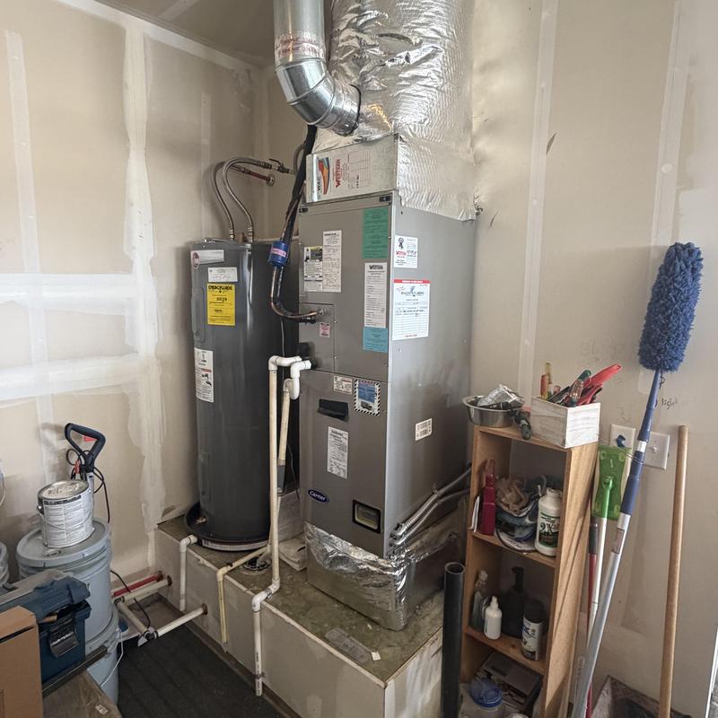 Heat pump furnace blower motor and condensate drain area Heat pump furnace blower motor and condensate drain area