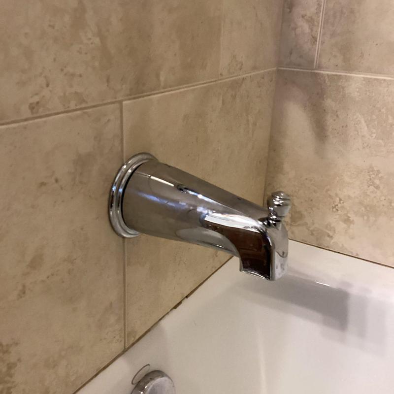 Tub spout installation on tiled bathtub wall Tub spout installation on tiled bathtub wall