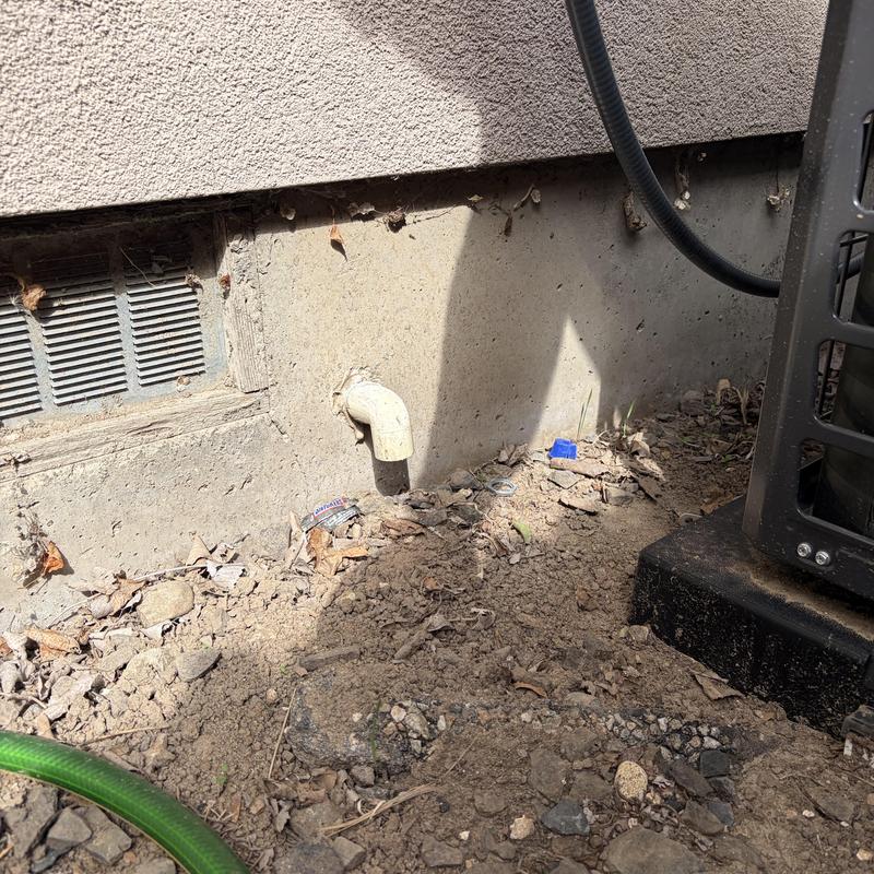 Air conditioner condensate drain pipe outside home Air conditioner condensate drain pipe outside home