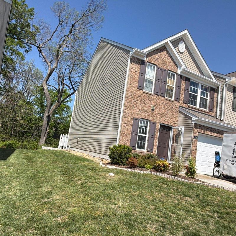 Roofing system hail damage inspection at residential building