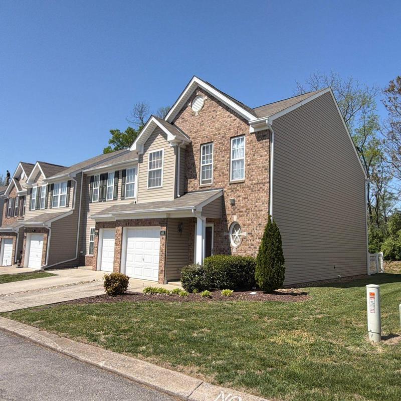 Roof shingles hail damage inspection on townhouse