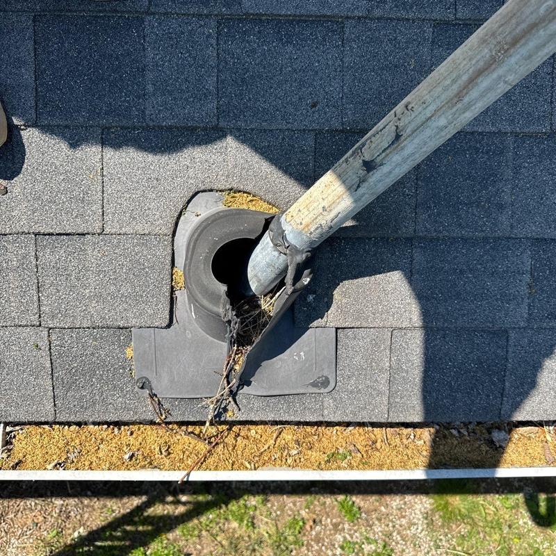 Roof vent pipe flashing with worn and damaged sealant