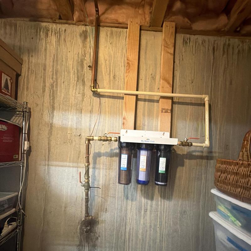 Water filtration system with bypass loop and piping