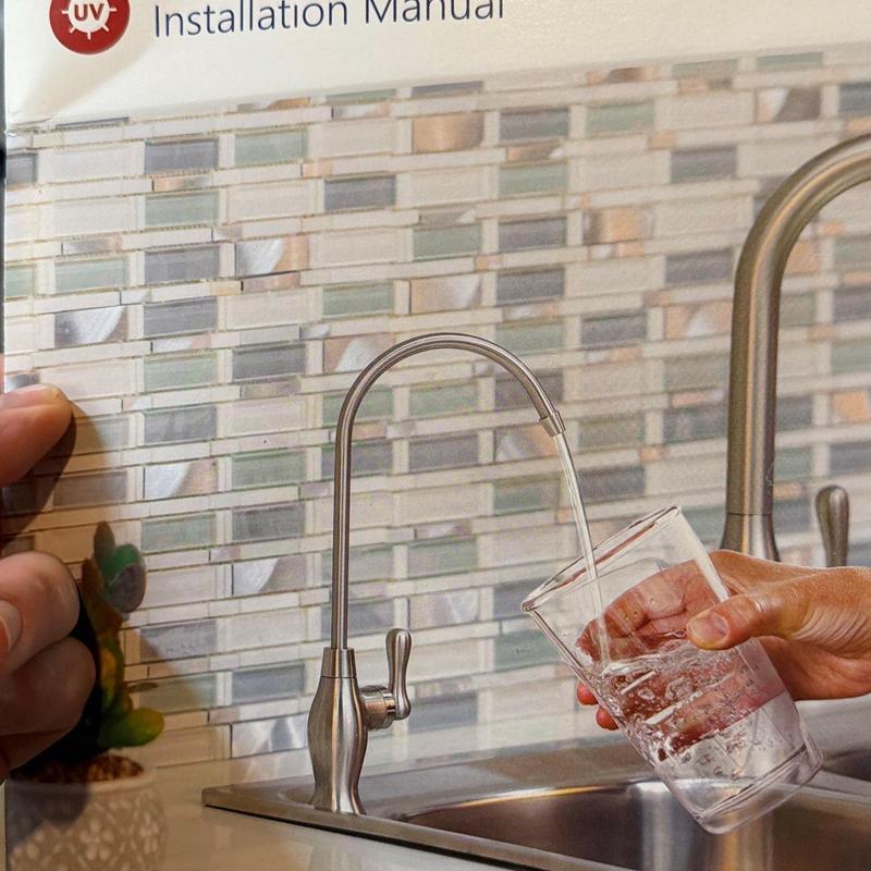 RO water filtration faucet filling glass