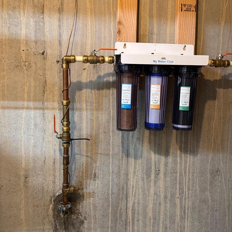 Water filtration system with bypass loop and PRV replacement