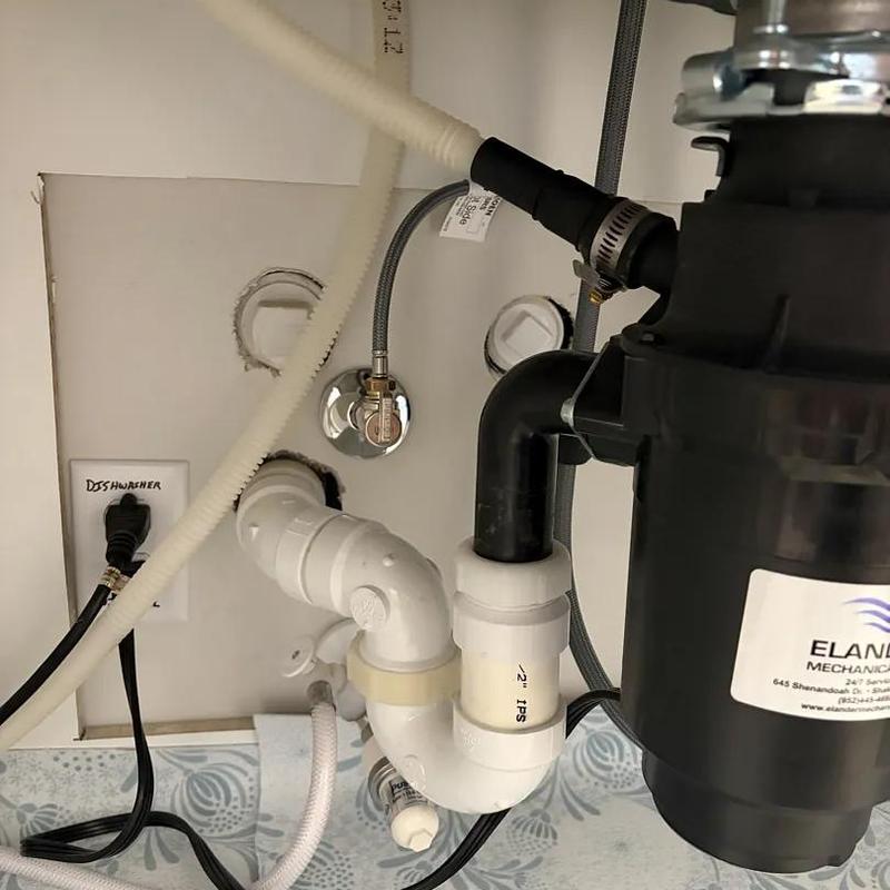 Kitchen faucet supply lines and shutoff valves under sink