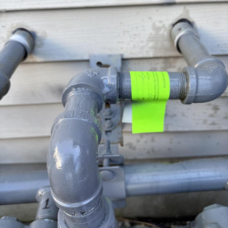 Water heater gas line with replaced valve and fittings