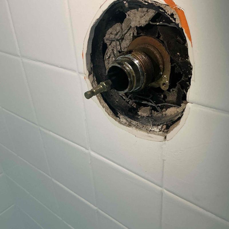 Shower cartridge and mixing valve removal in tiled wall Shower cartridge and mixing valve removal in tiled wall