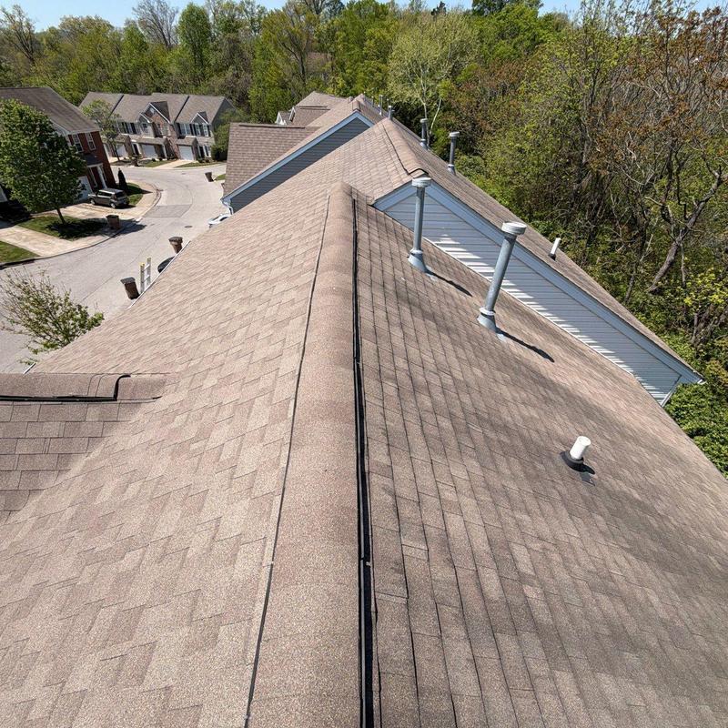 Asphalt shingle roof with ventilation pipes inspection