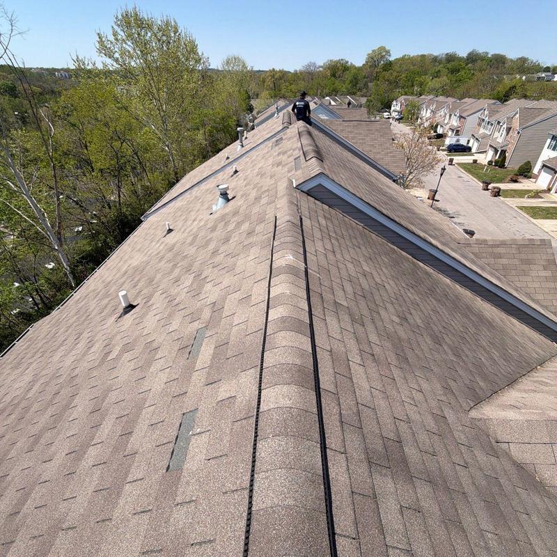 Asphalt shingle roof hail damage inspection on townhouse
