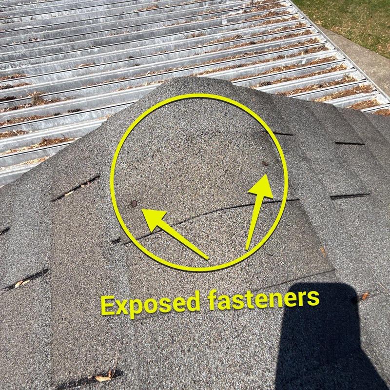 Roof shingles with exposed fasteners on metal roof edge