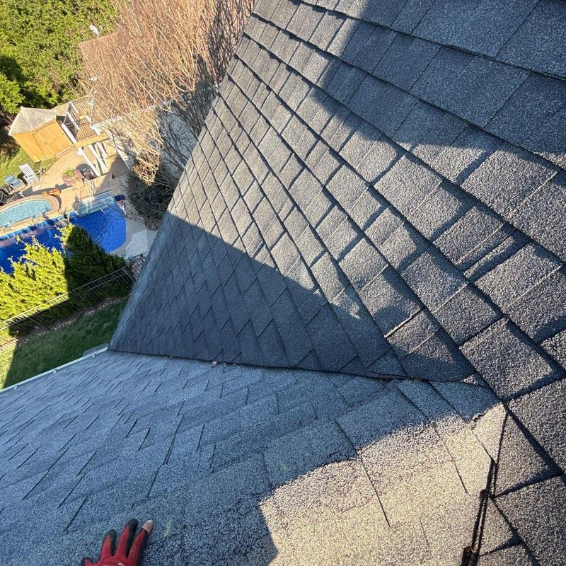 Asphalt roof shingles with hail damage inspection