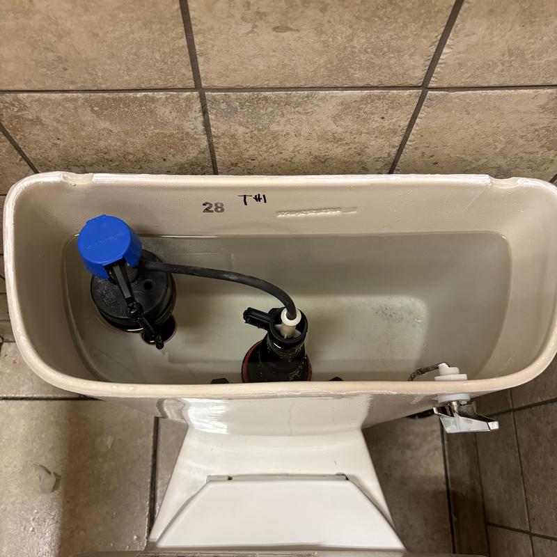 Toilet flush valve and flapper inside tank Toilet flush valve and flapper inside tank