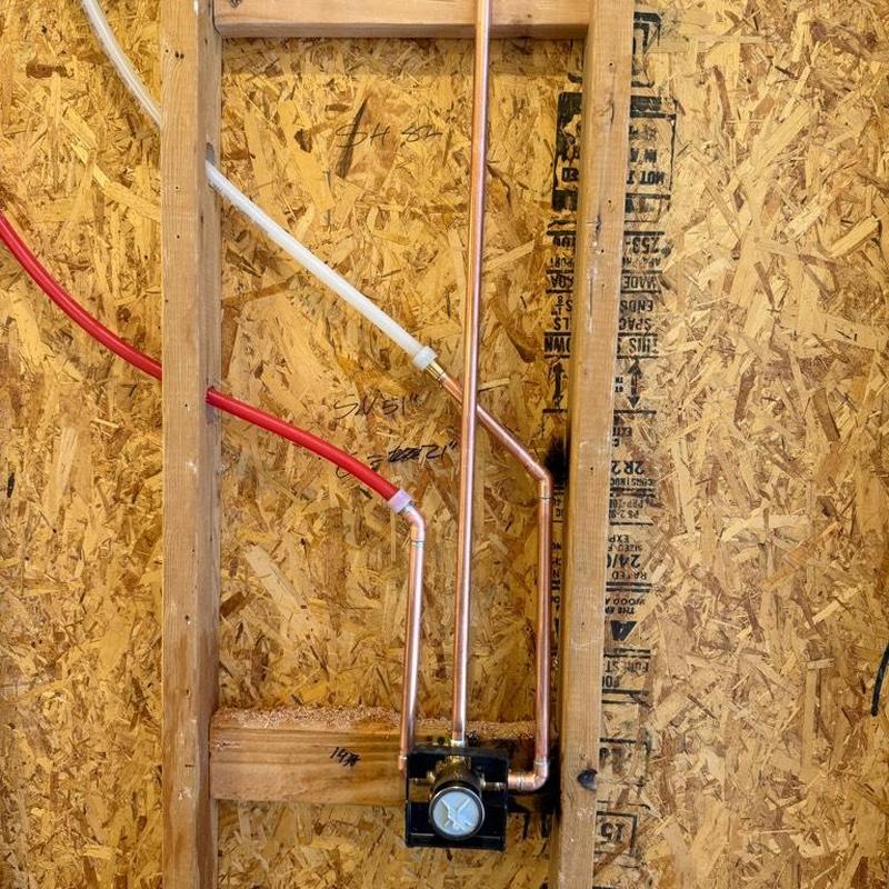 Shower valve with copper and PEX piping installation