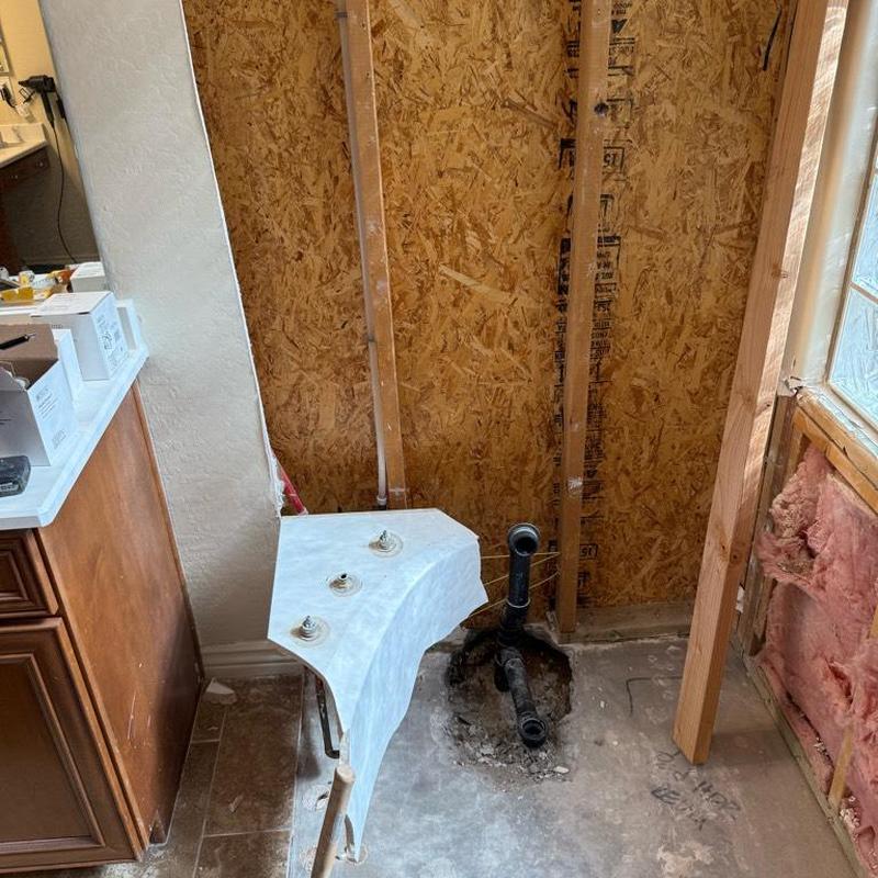 Shower valve removal and tub drain conversion site