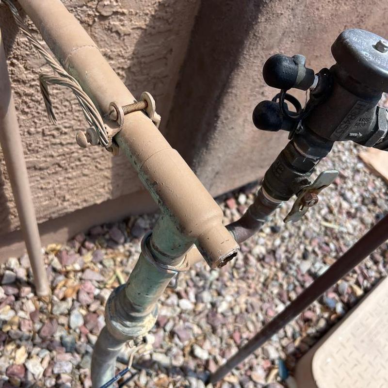 Outdoor hose bib riser with broken pipe section