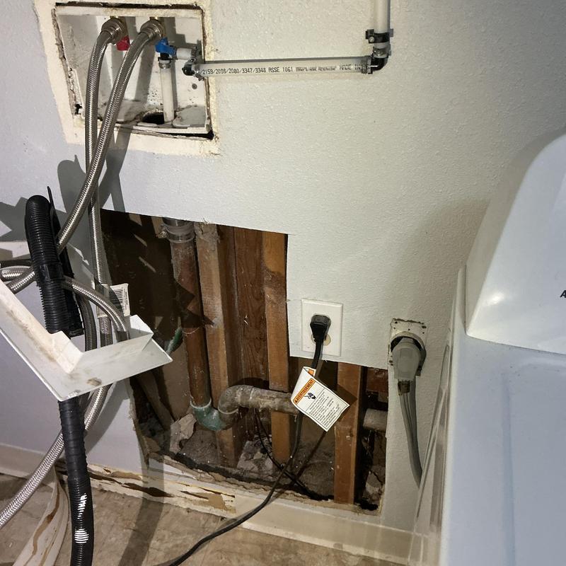 Copper drain pipes with open wall and exposed plumbing Copper drain pipes with open wall and exposed plumbing