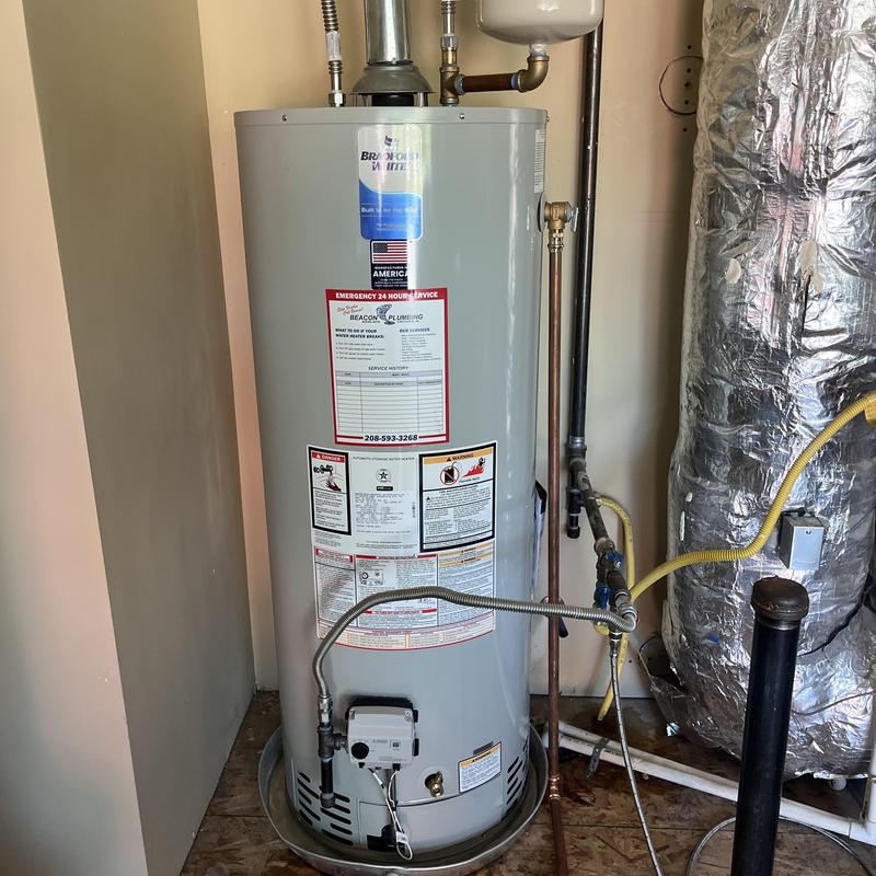 Water heater unit installation in utility room Water heater unit installation in utility room