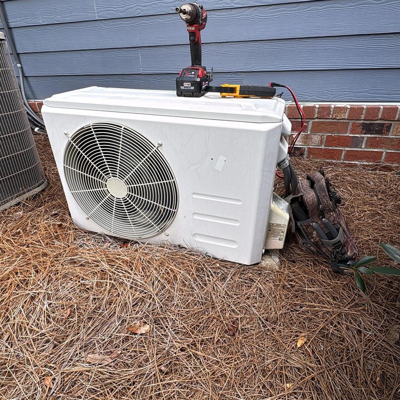 Mini-split outdoor condenser unit with drill on top Mini-split outdoor condenser unit with drill on top