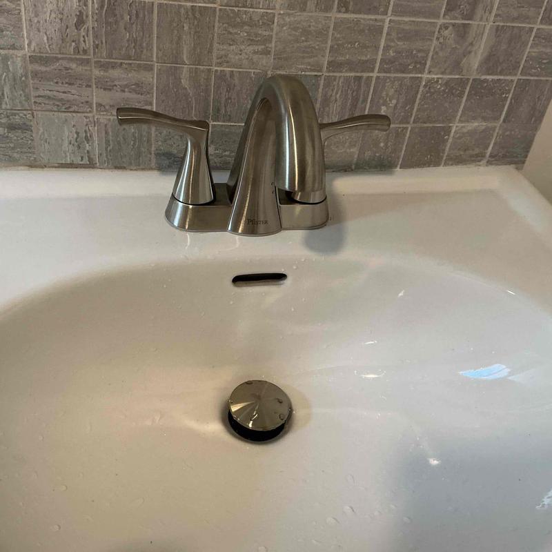 Kitchen faucet and sink with metal drain stopper Kitchen faucet and sink with metal drain stopper